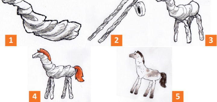 Figura amb paper de diari